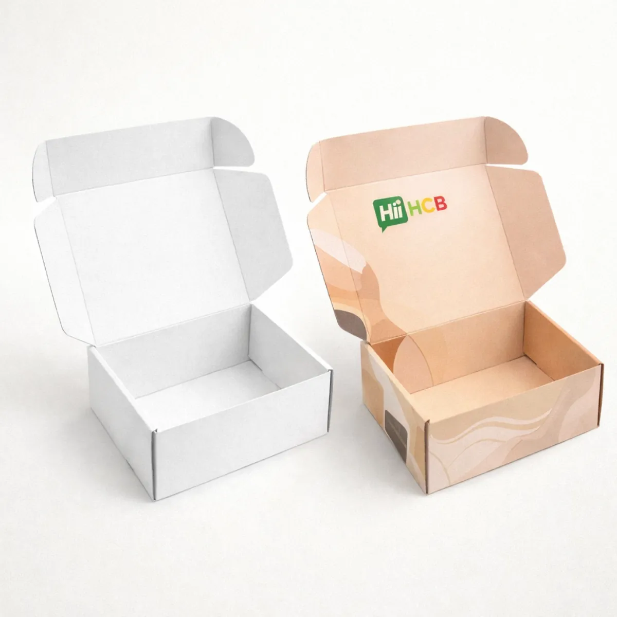 A stack of professionally printed shapewear boxes featuring clean lines and a soft- feminine colour palette-